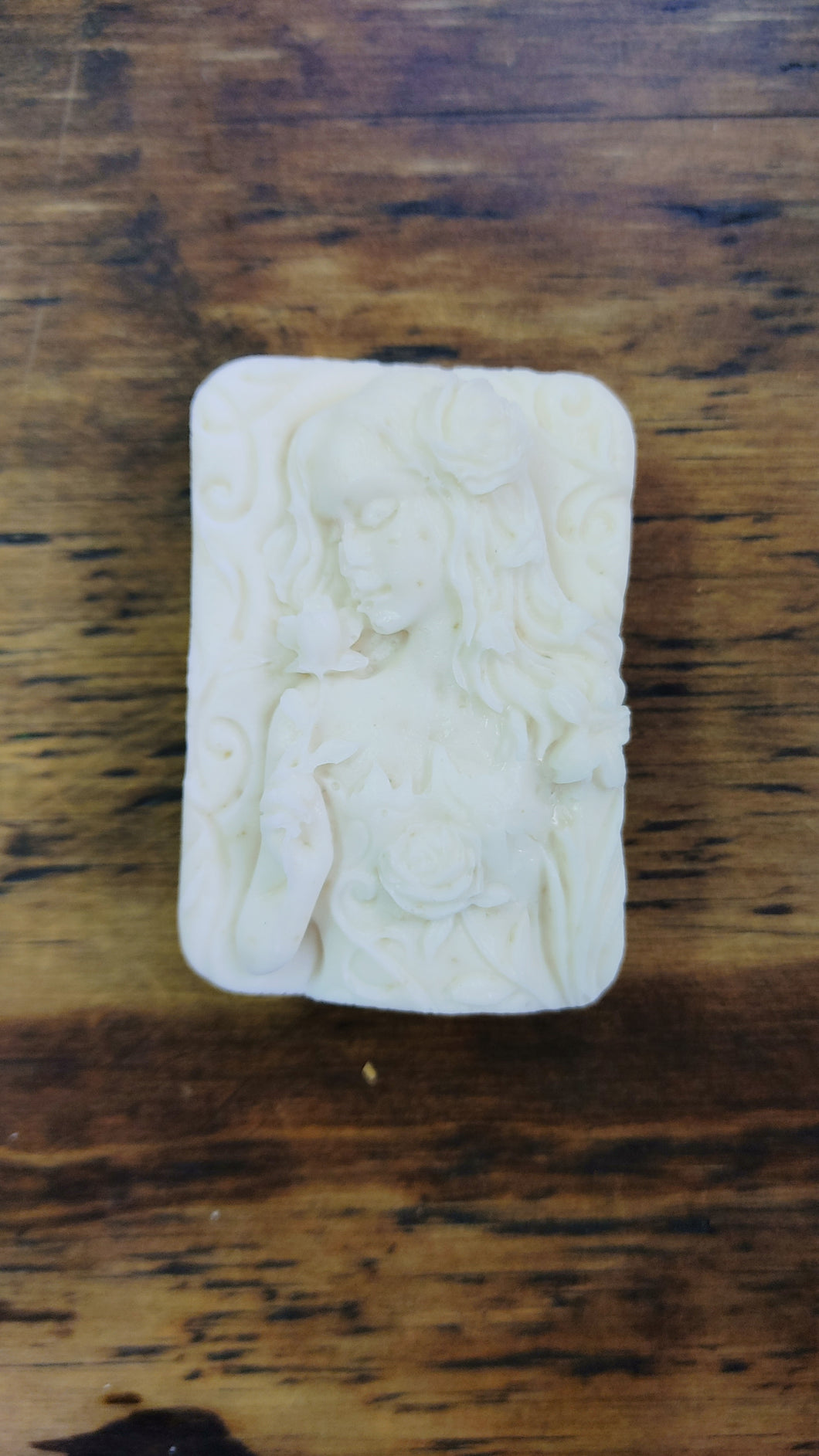 Girl holding a rose soap