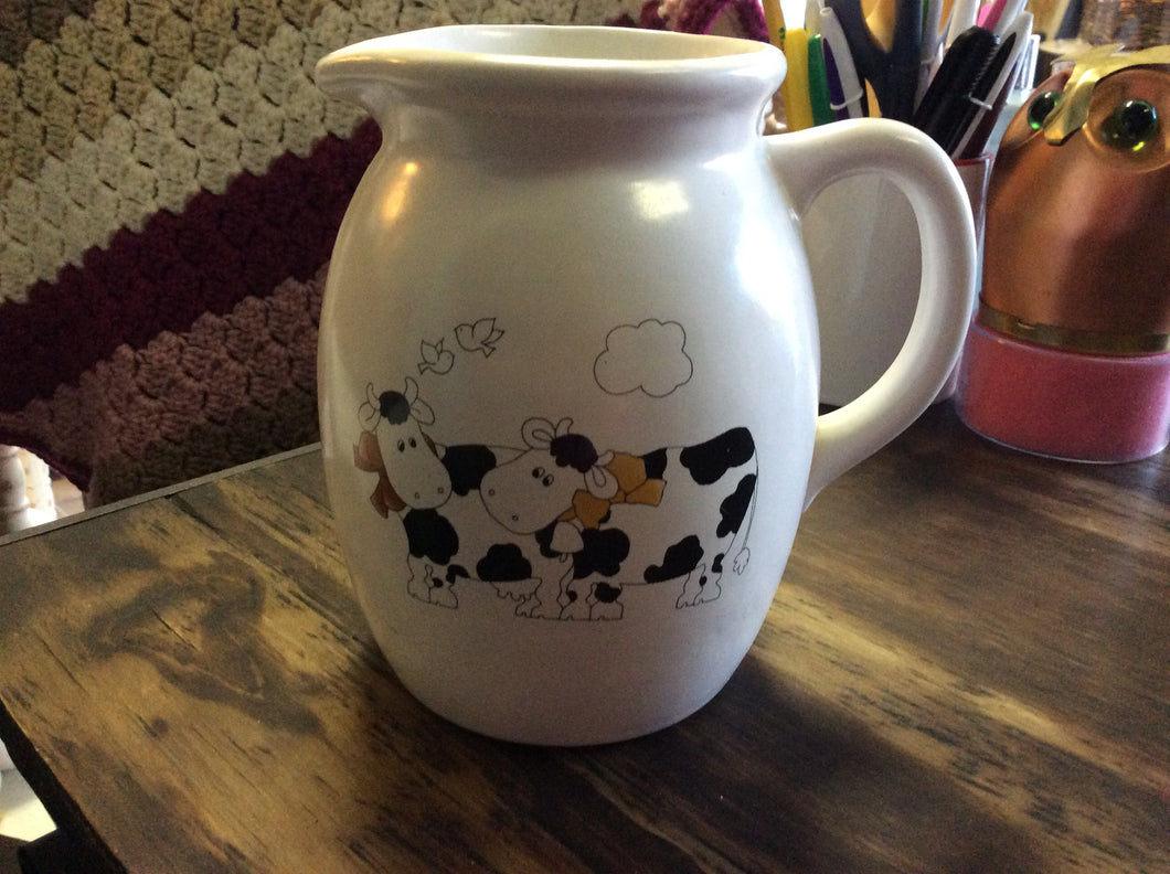 Cow cartoon milk jug